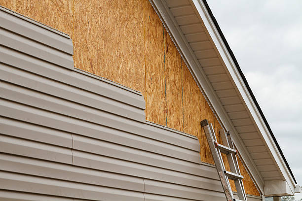 Professional Siding Contractor technician working in Wycombe, PA